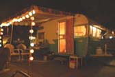 Vintage 1962 Shasta Trailer on party night, with lantern lights and awning